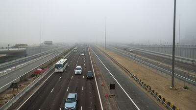 Fog, misty conditions during the morning at the Khalifa-Masdar bridge area. Victor Besa / The National