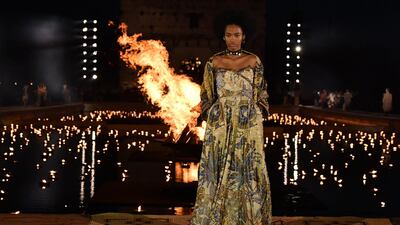 A model walks the runway during the Christian Dior Cruise 2020 show. Getty Images