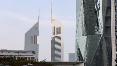 Experts believe the 15 per cent corporate tax rate for large multinationals won't deter companies from setting up in the UAE. Chris Whiteoak / The National