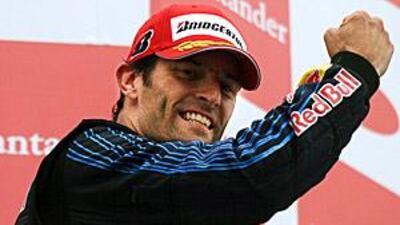 Red Bull's Mark Webber celebrates on the podium after winning the German Grand Prix.
