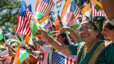 People stand in prayer and song during a celebration of India's 75th Independence Day in Nay Aug Park in Scranton, Pennsylvania, in August 2022. The Times-Tribune / AP