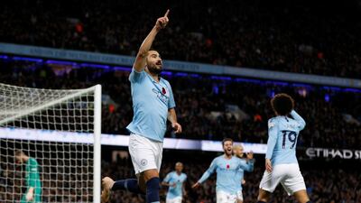 Manchester City's Ilkay Gundogan celebrates scoring City's third goal. Reuters