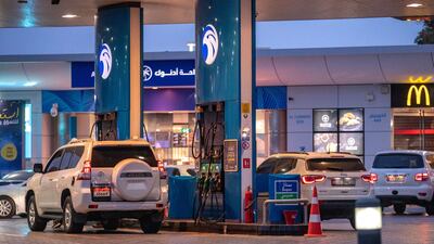 An Adnoc petrol station in central Abu Dhabi. Petrol prices for September 2022 have been announced. Victor Besa / The National