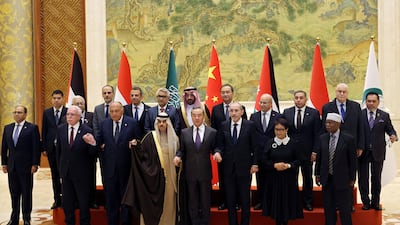 Chinese Foreign Minister Wang Yi attends a group photo session with Saudi Foreign Minister Prince Faisal bin Farhan, Jordanian Deputy Prime Minister and Foreign Minister Ayman Safadi, Egyptian Foreign Minister Sameh Shoukry, Indonesian Foreign Minister Retno Marsudi, Palestinian Foreign Minister Riyad Al Maliki and Organisation of Islamic Co-operation Secretary General Hissein Brahim Taha, at the Diaoyutai State Guesthouse in Beijing. Reuters