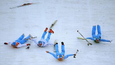 Gold medalists Magnus Hovdal Moan, Haavard Klemetsen, Magnus Krog and Joergen Graabak of Norway celebrate after the Nordic Combined Men's Team 4x5km during Day 13 of the Sochi 2014 Winter Olympics at RusSki Gorki Jumping Center on February 20, 2014 i. Richard Heathcote / Getty Images