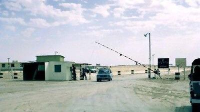 The border crossing between Dubai and Abu Dhabi. Courtesy of Peter Jackson