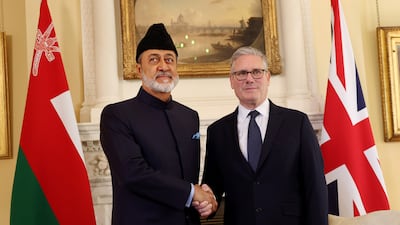 Sultan Haitham and Mr Starmer shake hands. Bloomberg