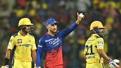 Royal Challengers Bengaluru's captain Faf du Plessis (C) gestures during the Indian Premier League (IPL) Twenty20 cricket match between Royal Challengers Bengaluru and Chennai Super Kings at the M Chinnaswamy Stadium in Bengaluru on May 18, 2024. (Photo by Idrees MOHAMMED / AFP) / -- IMAGE RESTRICTED TO EDITORIAL USE - STRICTLY NO COMMERCIAL USE --