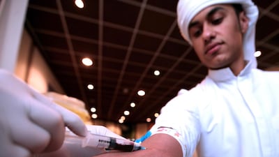A Sharjah University Mens College student undergoes a test for thalassaemia. Photo: Paulo Vecina / The National