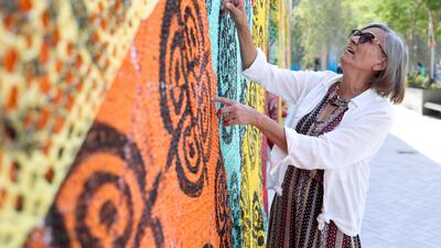 Each colour represents a different community around the world and it has been woven into a net design to show how the world is interconnected.