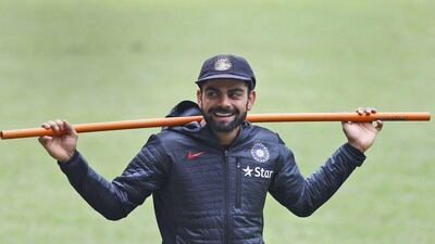 India’s Virat Kohli smiles as he trains during Friday’s practice session on the eve of their second Test against South Africa in Bangalore. Aijaz Rahi / AP