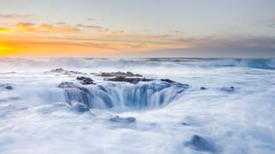 Honourable Mention, Water, Tom Fenske, US. The drainpipe of the Pacific, a natural hole in the rock along the Oregon Coast.