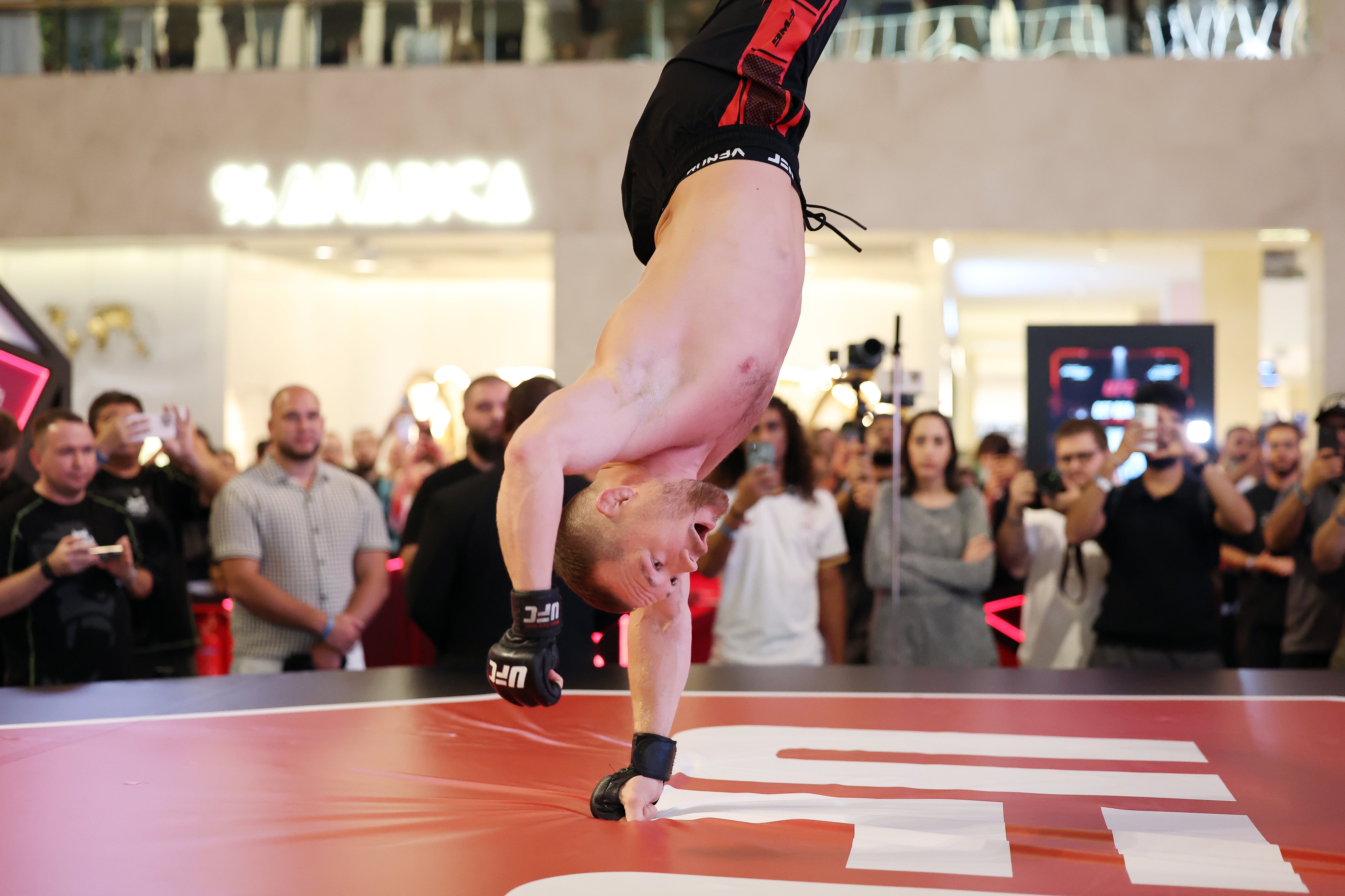 Champion Petr Yan takes part in an open workout.