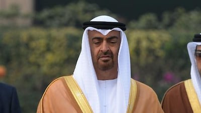 Sheikh Mohammed bin Zayed, Crown Prince of Abu Dhabi and Deputy Supreme Commander of the Armed Forces, pays a tribute at Rajghat, the memorial for Mahatma Gandhi in New Delhi on Wednesday. Prakash Singh / AFP