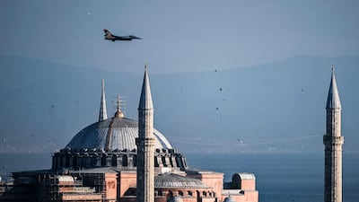 A demonstration flight over Istanbul's Hagia Sophia in Istanbul last month. Ankara’s rhetoric-action divergence is something of a pattern. AFP