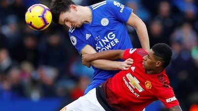 Manchester United's Marcus Rashford in action with Leicester City's Harry Maguire. Reuters