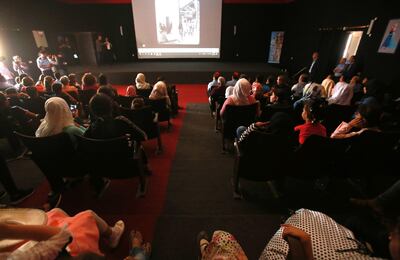 Residents of Al Zaatari refugee camp at Cinema Zaatari’s first screening. AFP