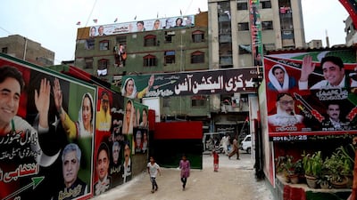 A street is decorated with banners for Bilawal Bhutto Zardari, leader of Pakistan Peoples Party, ahead of elections in Karachi, Pakistan, Wednesday, July 18, 2018. Shakil Adil / AP