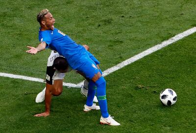 Neymar goes down under a light challenge by Costa Rica's Giancarlo Gonzalez. EPA