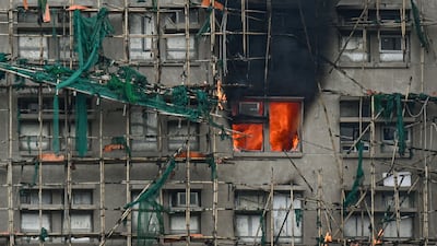 Some apartments were still burning after the blaze at the Wang Fuk Court residential estate. AFP