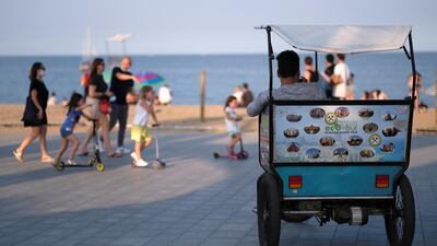 A man sits on his rickshaw waiting for clients as Spain officially reopens the borders amid the coronavirus disease outbreak, in Barcelona, Spain. Reuters