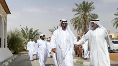 The Crown Prince of Abu Dhabi attends a lunch reception hosted by Jumaa Saeed Al Amimi, right. Mohamed Al Baloushi for the Ministry of Presidential Affairs