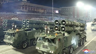 Vehicles with multiple rocket launchers are paraded for the crowds. Reuters