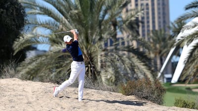 Rory McIlroy of Northern Ireland plays a shot during the final round of the 2016 Dubai Desert Classic at the Emirates Golf Club in Dubai on February 7, 2016. AFP / KARIM SAHIB