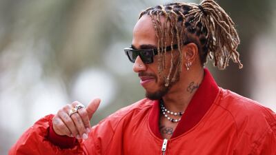 Lewis Hamilton walks in the Paddock at Bahrain International Circuit. Getty