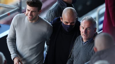 Left to right: Barcelona defender Gerard Pique, Manchester City manager Pep Guardiola and City director of football Txiki Begiristain before the press conference. Reuters