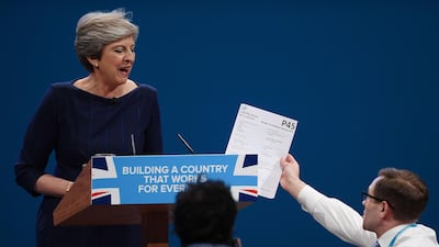 Mrs May gets her P45 by a pranksteter at Conservative Party Conference at Manchester Central on October 4, 2017. Getty Images