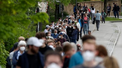 People queue at a vaccination centre in Ebersberg near Munich, Germany, Saturday, May 15, 2021. AP