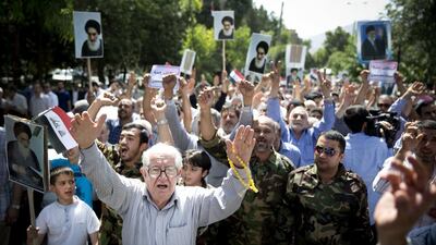 Iraqis living in Iran stage a rally in Tehran against militants who have seized control of large parts of Iraq. Maryam Rahmanian for The National / June 20, 2014