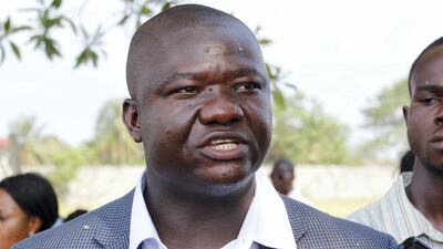 Tolbert Nyenswah makes remarks during the official discharging ceremony of two Ebola survivors from a treatment unit in Monrovia, Liberia, on December 3, 2015. Ahmed Jallanzo / EPA
