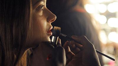 A model has her make-up done backstage ahead of the David Koma show during the 2012 London Fashion Week. Facundo Arrizabalaga / EPA