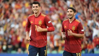 Spain forward Alvaro Morata (L) celebrates scoring the opening goal against Portugal in their Uefa Nations League match at the Benito Villamarin stadium in Seville on June 2, 2022. AFP