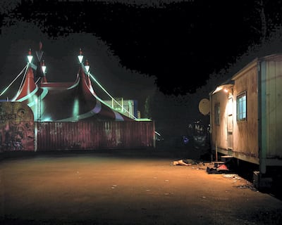 The exhibit is lit only by a faint glow that displays Lara Tabet’s beautiful, haunting, crime scenes. Courtesy Galerie Janine Rubeiz
