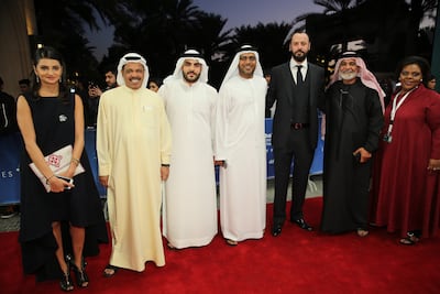Emirati director Majid Al Ansari, third from right, with the cast of psychological thriller Zinzana. Getty Images
