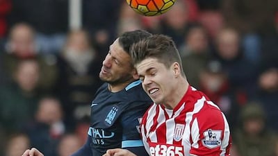 Manchester City’s Martin Demichelis in action with Stoke City’s Marco van Ginkel. Reuters / Phil Noble