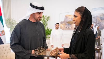 President Sheikh Mohamed meets Emirati chess grandmaster Rouda Essa Alserkal in Abu Dhabi. All Photos: Abdulla Al Neyadi / UAE Presidential Court