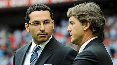 Khaldoon al Mubarak, the Manchester City chairman, left, and Roberto Mancini, the manager, have a scouting network at their disposal that numbers 32.