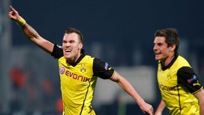 Kevin Grosskreutz, left, scored the winner for Borussia Dortmund on Wednesday night. Claude Paris / AP