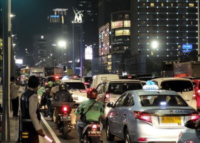 Dense traffic is seen along a main road during restrictions on vehicle usage in downtown Jakarta. AFP