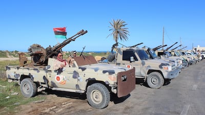 Vehicles and militants, reportedly from the Misrata militia, gather to join Tripoli forces, in Tripoli, Libya. EPA