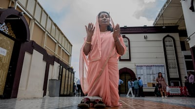 Worshippers at St Michael’s Catholic Church in Sharjah as the UAE continues to come under attack from Iran. Ahmed Ramzan / The National