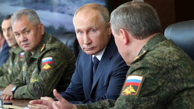 Russian President Vladimir Putin and Defence Minister Sergei Shoigu, left, in September 2020. AP