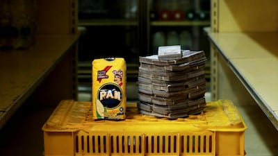 A package of corn flour is pictured next to 2,500,000 bolivars