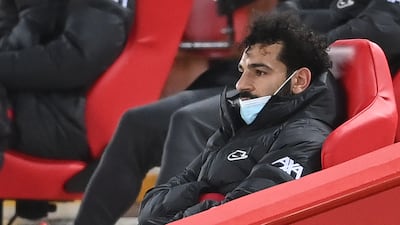 Liverpool's Mohamed Salah in the stands after being substituted during the match against Chelsea at Anfield. PA