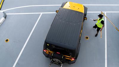 The drive-in cinema is making a comeback at Mall Of The Emirates, and a large screen has been assembled in the shopping centre's upper parking lot, on level 3, right underneath Ski Dubai's slope. Patrons take position, switch off their engines and settle in for the film. Reem Mohammed / The National