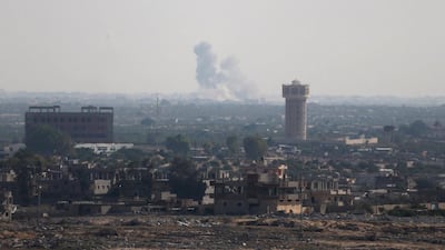 Smoke rises in the northern Sinai Peninsula as seen from Egypt's border with the Gaza Strip on July 1, 2015. Ibraheem Abu Mustafa / Reuters